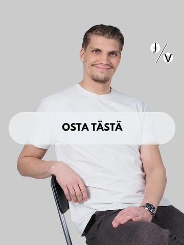 Young man wearing a white t-shirt sitting on a chair.