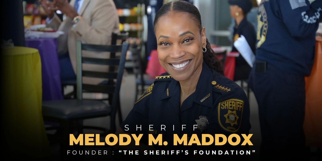 Sheriff Melody M. Maddox smiling in uniform.