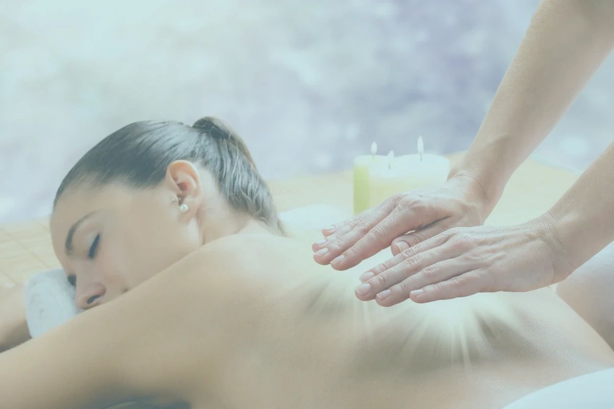 Woman receiving relaxing massage therapy at spa treatment