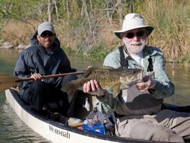 Marcus Rodriguez and the late Harry Daley  on the Devils River with a nice 21 inch smallmouth bass.