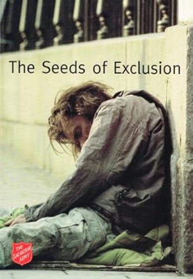 A homeless person sitting against a wall with the text 'The Seeds of Exclusion'.