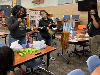 Junior Mentors Umutoni ,Skylar and Yoti. (L-R)