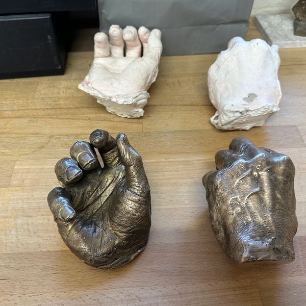 plaster patterns and finished bronze sculptures made from them