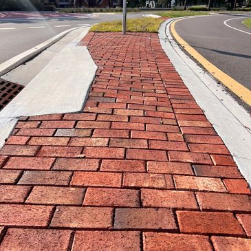 Vintage style brick pavers installed in a median in Sanford Florida.