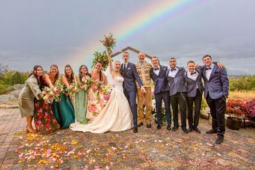 Bridal Party Standing under a beautiful rainbow! 