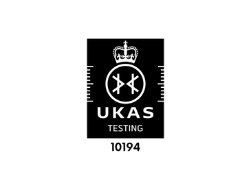 UKAS Testing logo with crown and ruler design in black and white.