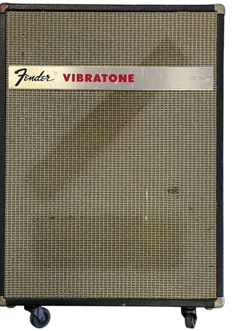 Vintage Fender Vibratone speaker cabinet with a worn grille.