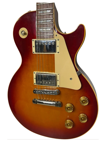 Classic sunburst electric guitar with dual humbucker pickups and gold control knobs.