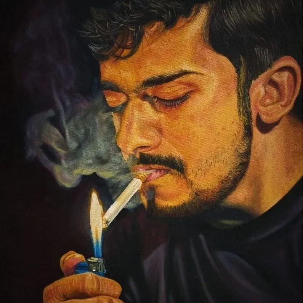 A man lighting a cigarette with a lighter, smoke swirling around.