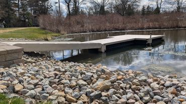 Wave Armor floating dock installed on a private pond in Norton, Ohio.