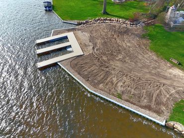 Custom WearDeck dock and vinyl seawall on Congress Lake in Hartville, Ohio.