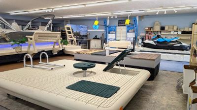 Picture of AquaLife Dock Shop Showroom featuring floating docks boat and jetski.