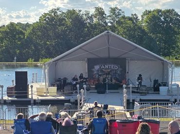 Live Band Playing on a large Wave Armor floating Dock platform installed in Big Prarie, Ohio