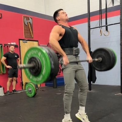 Athlete lifting weights during open gym at Monument Fitness Charlestown