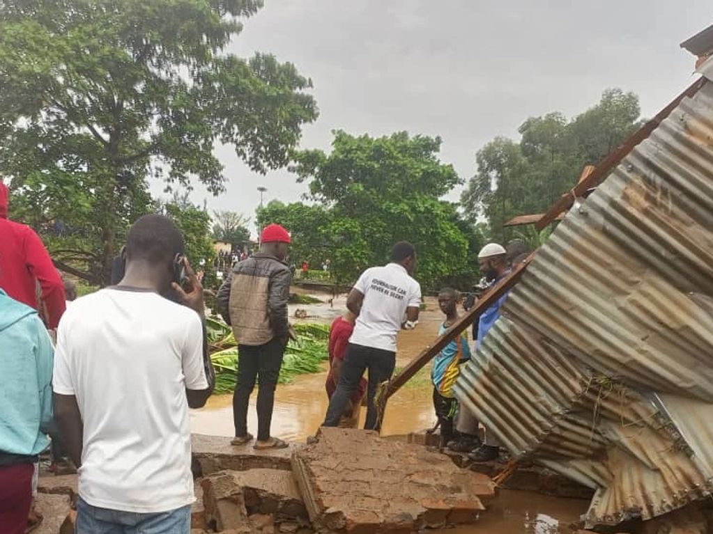 Place heavily flooded and house destroyed