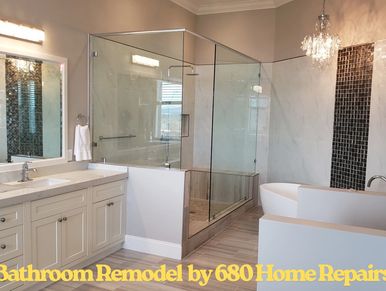 Modern bathroom remodel with glass shower and freestanding tub.