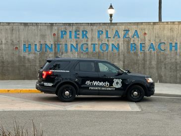 Private security vehicle parked at Pier Plaza Huntington Beach.