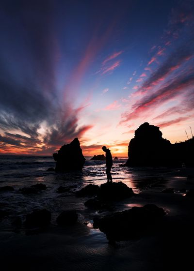 a man pondering on rocks about what does it mean to say hindsight is 2020