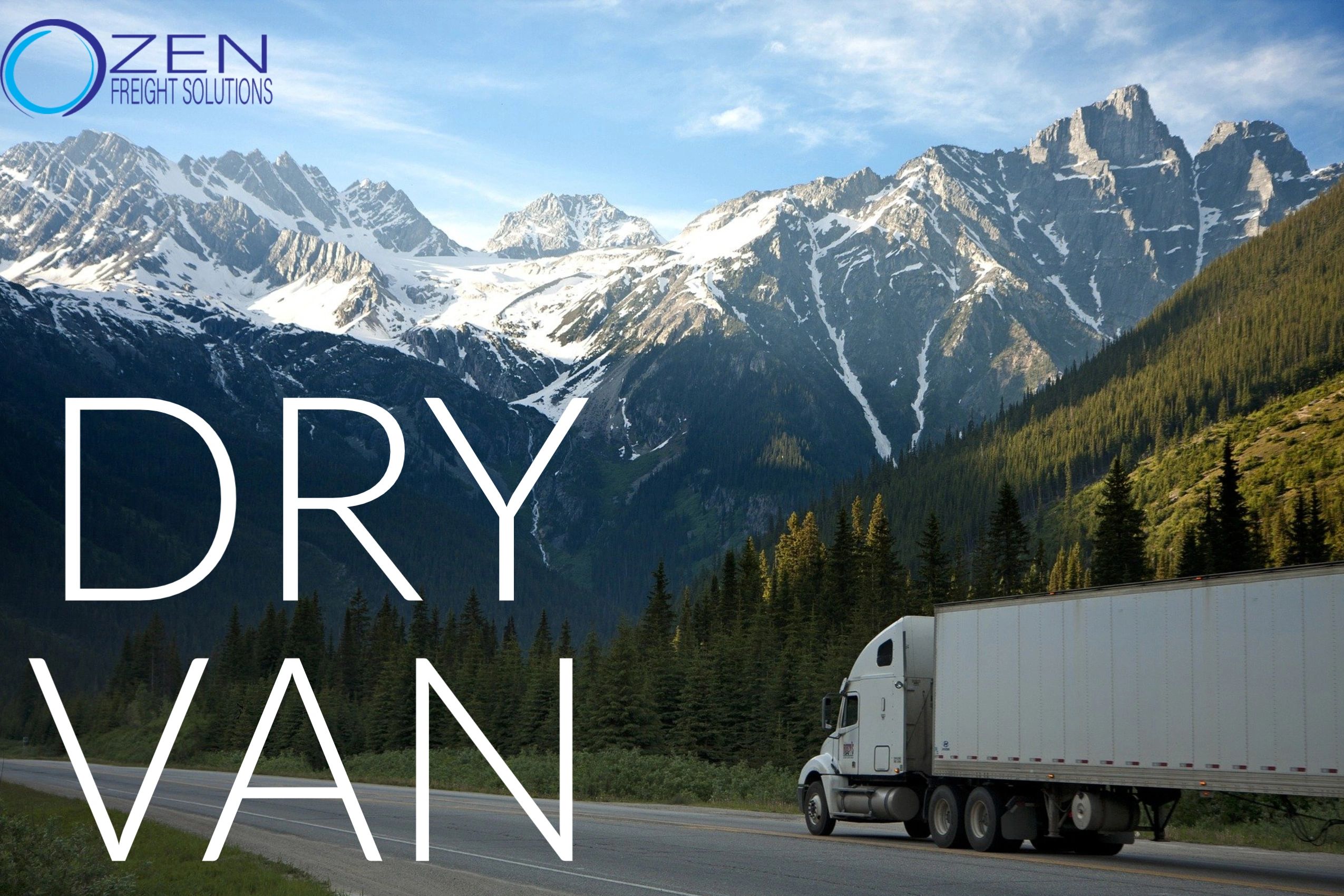 18-wheel truck driving past beautiful snow-covered mountains. 