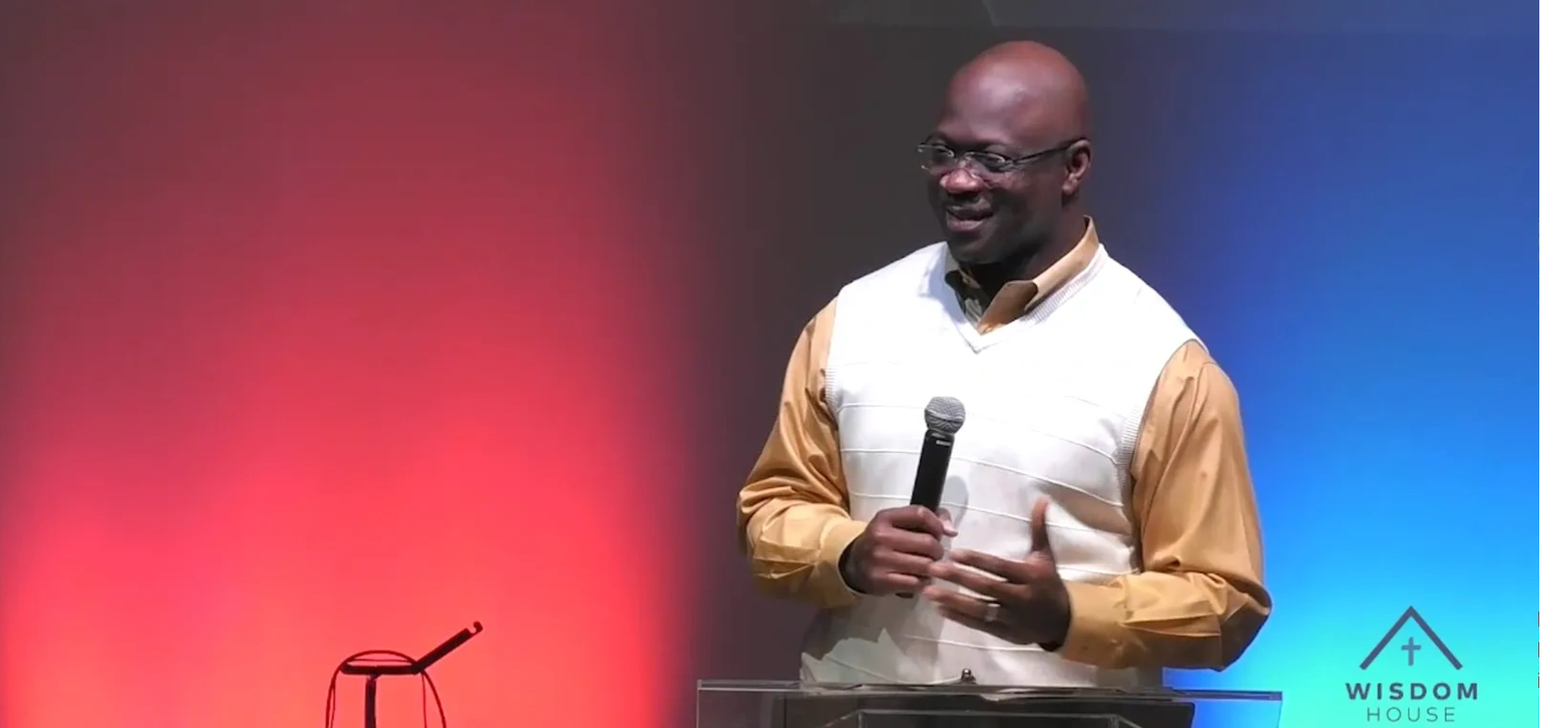 Pastor Solomon Ofori-Ansah speaking at a church service.