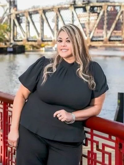 Picture of Maria Valdez with Chicago river in the background