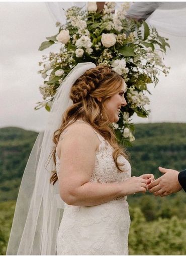 brides hair half up half down with a braid 