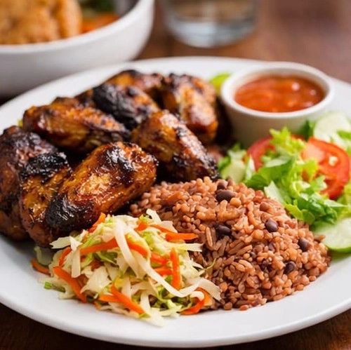 Grilled chicken with rice, coleslaw, salad, and dipping sauce on a white plate.