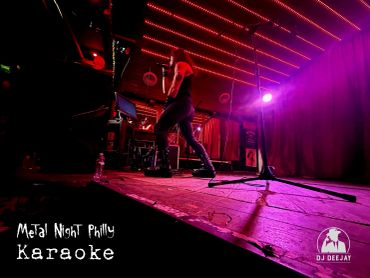 Metal Night Philly karaoke event with singer on stage and vibrant lighting.