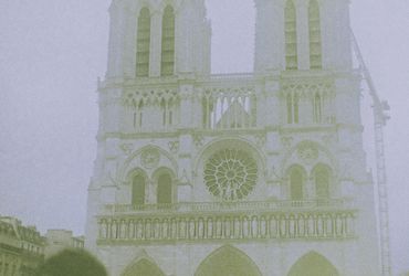 Notre-Dame Cathedral in Paris on a foggy day.