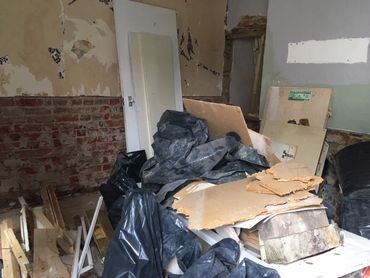 House Renovation Job Waste, In Front A Room Ready To Clear.
