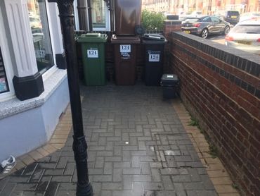 Forecourt Completely Clear After Mixed Waste Has Been Removed. 