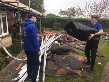 Removing Old Roofing Tiles, Felt And Batten. From A Beautiful Large Back Garden In Chichester.