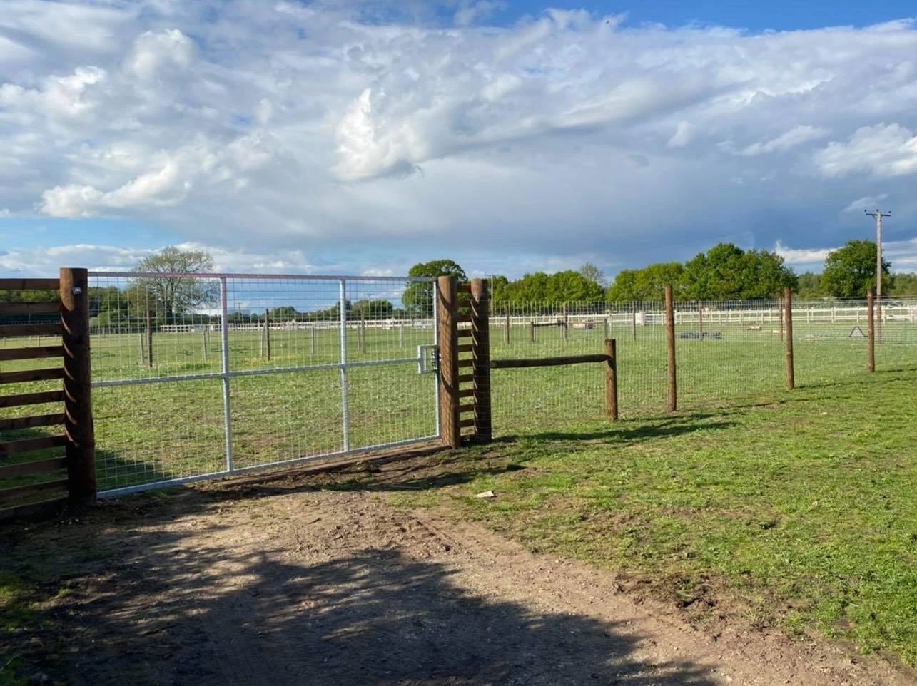 Dog fence installed with large gate