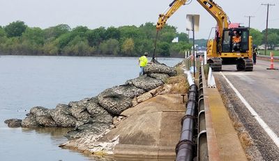 Texas Tuff Rock Bags being deployed in a bridge and embankment erosion and scour protection project 