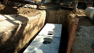 Septic tank and pump tank being installed in Arnold, CA