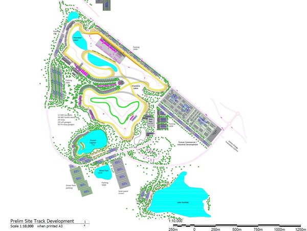 Detailed map of a large park with lakes, pathways, and parking areas.