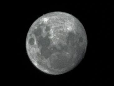 Close-up image of the full moon against a dark sky.