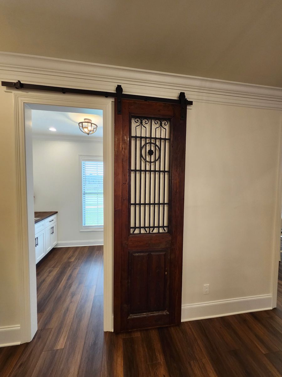 Detail of custom wrought iron and glass door