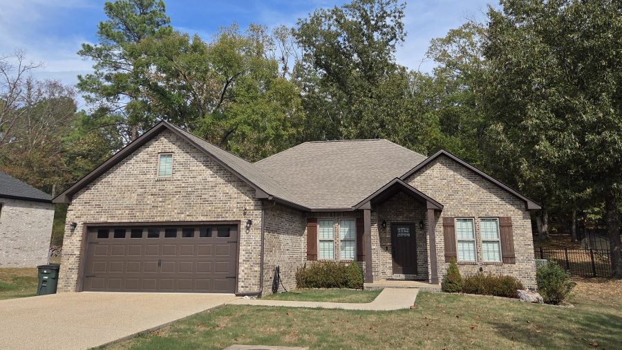 Brick and stone home with attached garage