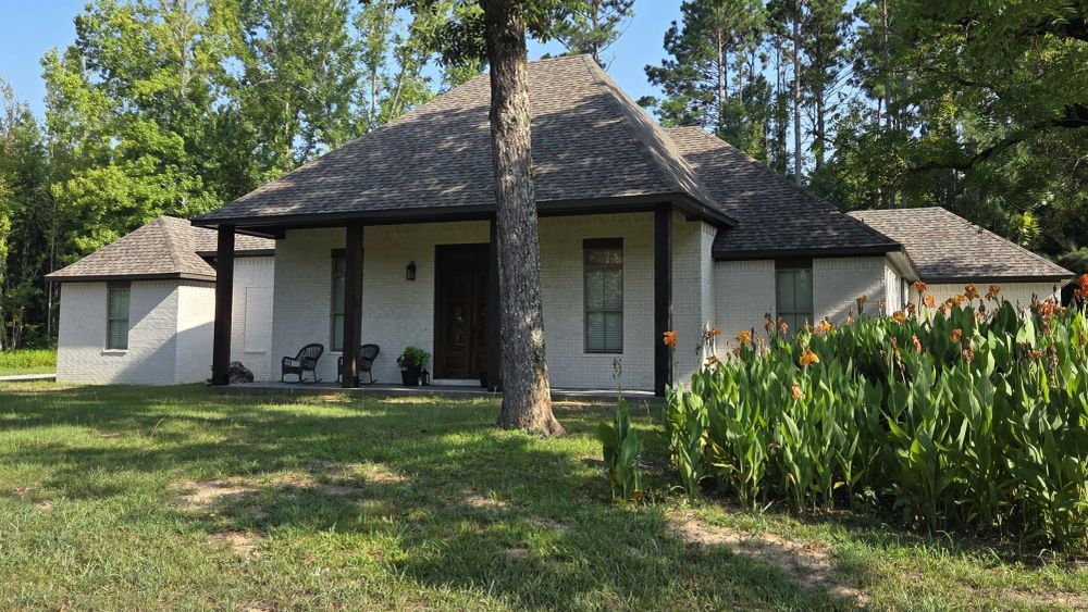 Custom Acadian-style brick home