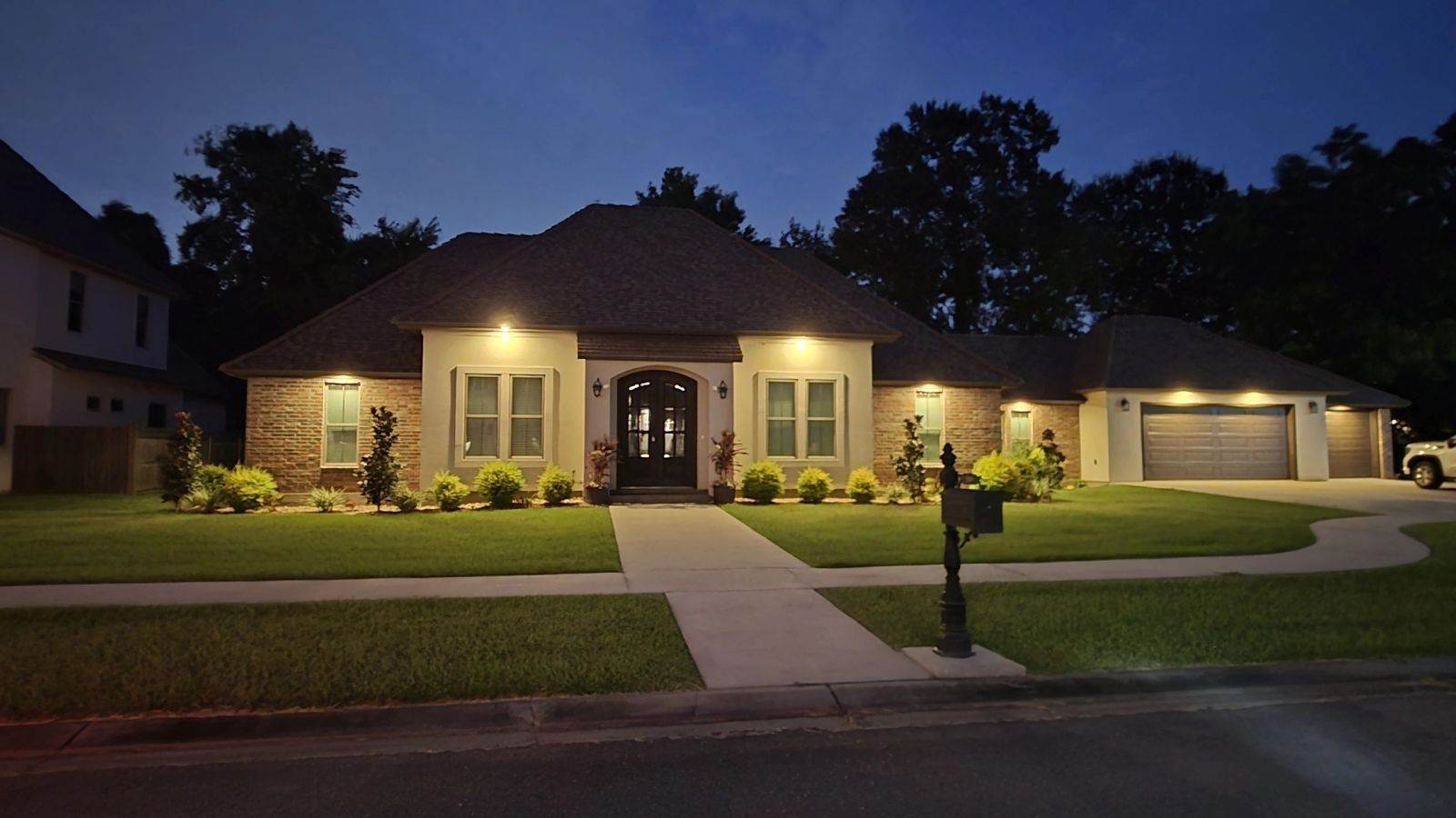Custom home lit at night
