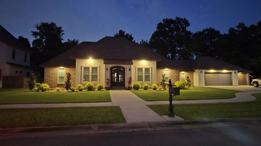Custom home lit at night