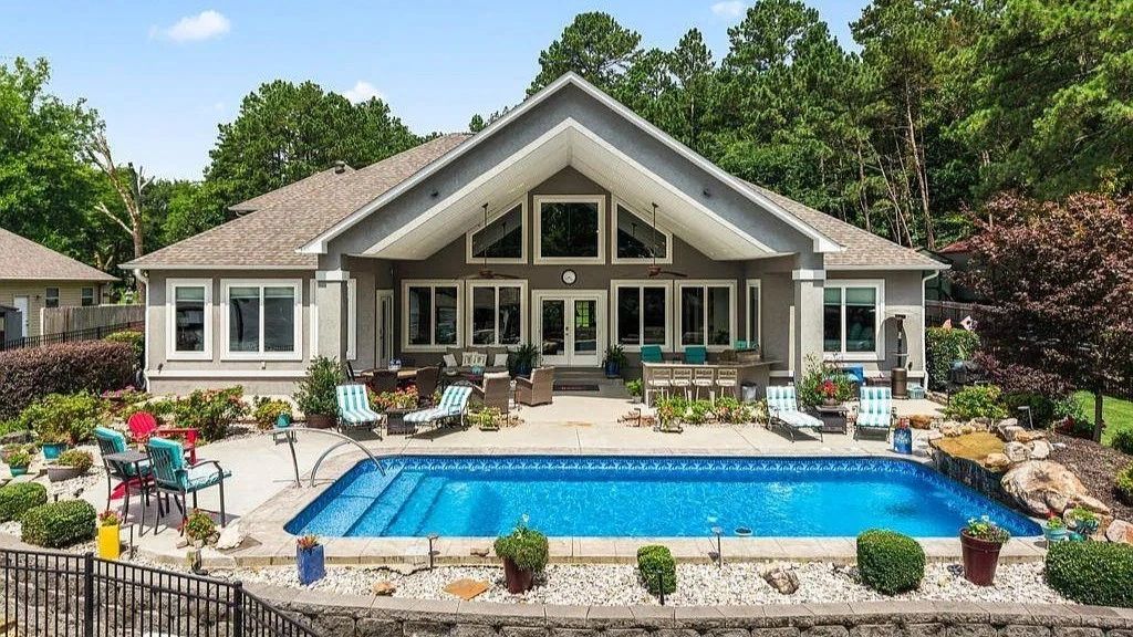 Rear elevation and pool of a custom home built by Rybard Homes