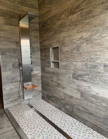 Plumbing services - new shower and drain installation