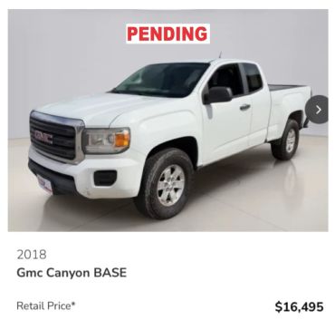 2018 white GMC Canyon BASE truck priced at $16,495 with pending status.