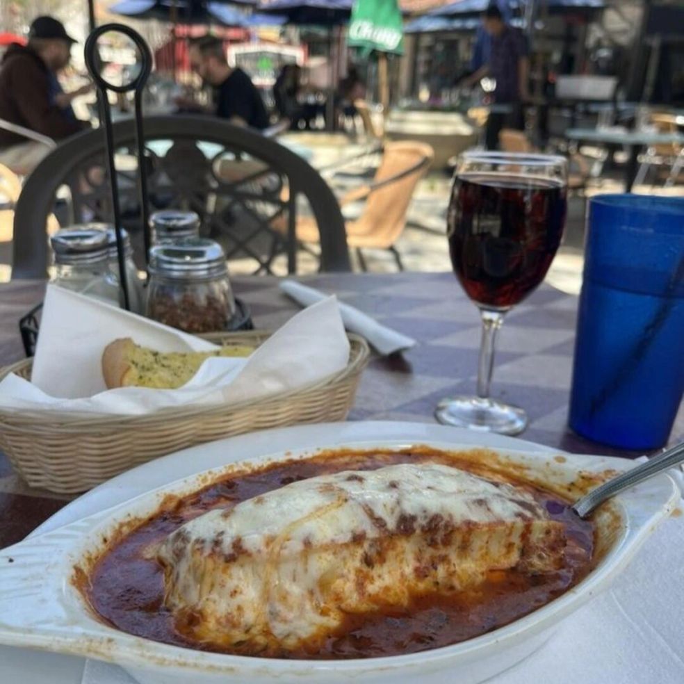 Lasagna with a glass of red wine