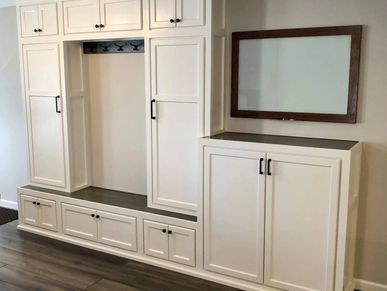 Custom entry built-in with bench, drawers, and coat locker
