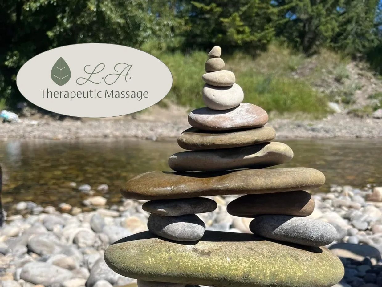 L.A. Therapeutic Massage logo with a zen rock formation.