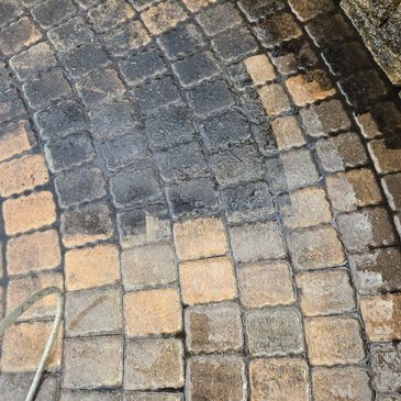 A in progress power / pressure washing brick assembly, visible comparison.