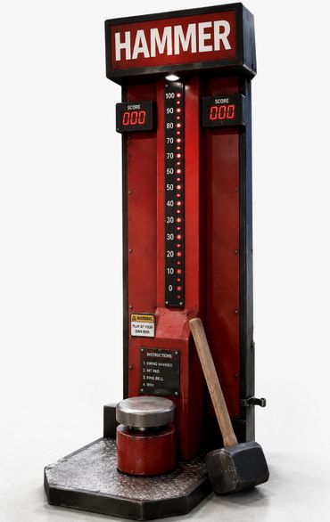 A classic carnival hammer strength game with a large mallet and score displays.
